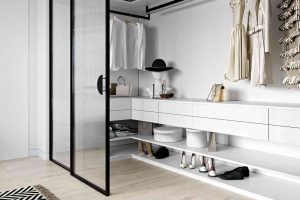 Walk in wardrobe with glass doors